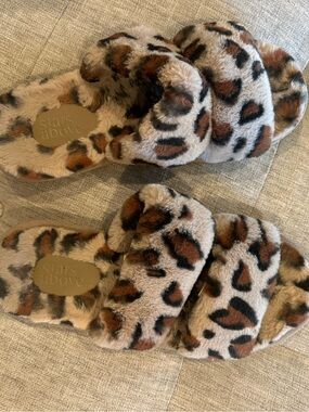 stars above Faux-Fur Leopard Slide Slippers in Brown and Black